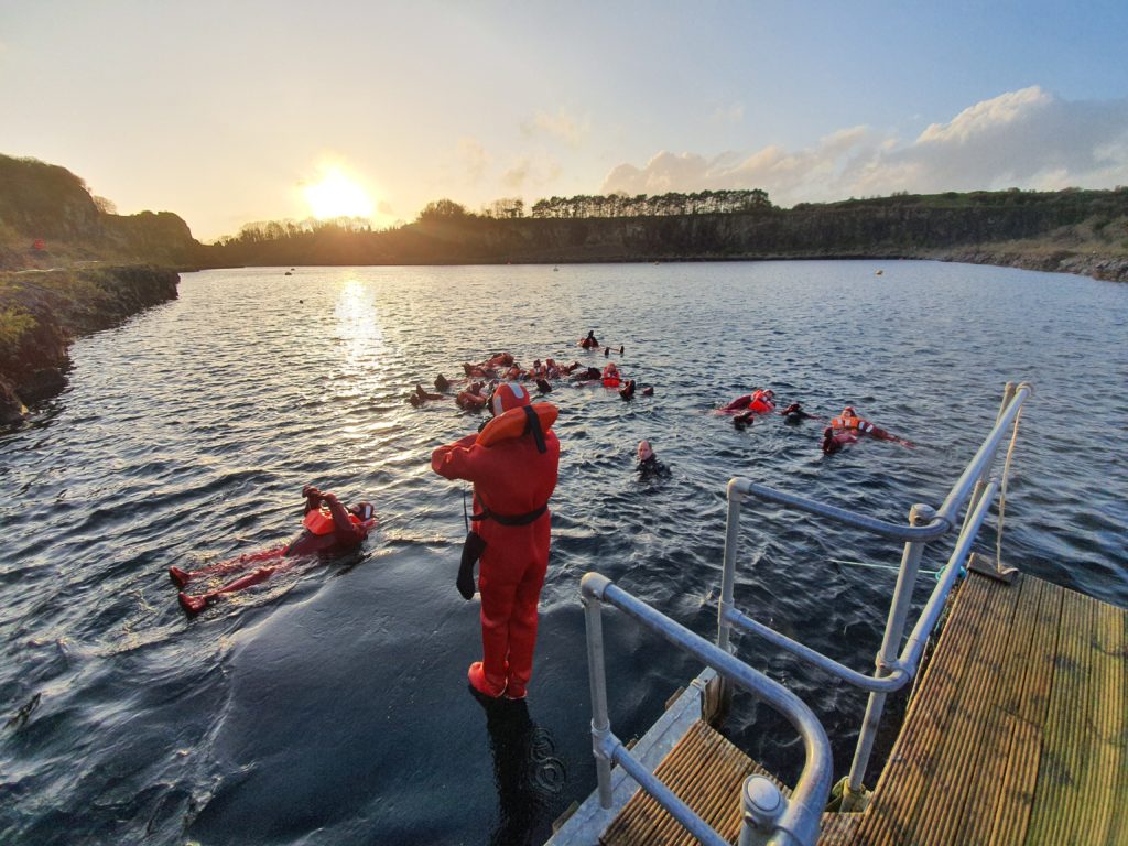 Water entry during an STCW Personal Survival Techniques course at South West Maritime Academy STCW Personal Survival techniques